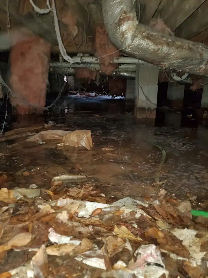 Crawl space flood assessment for Commercial Water Damage Restoration in Lower Salford